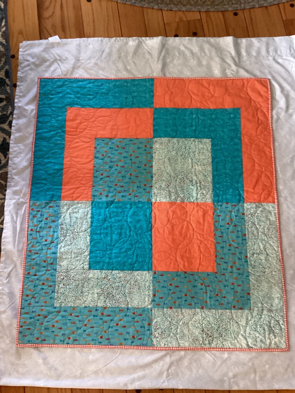 Baby quilt orange and teal 36”x40”